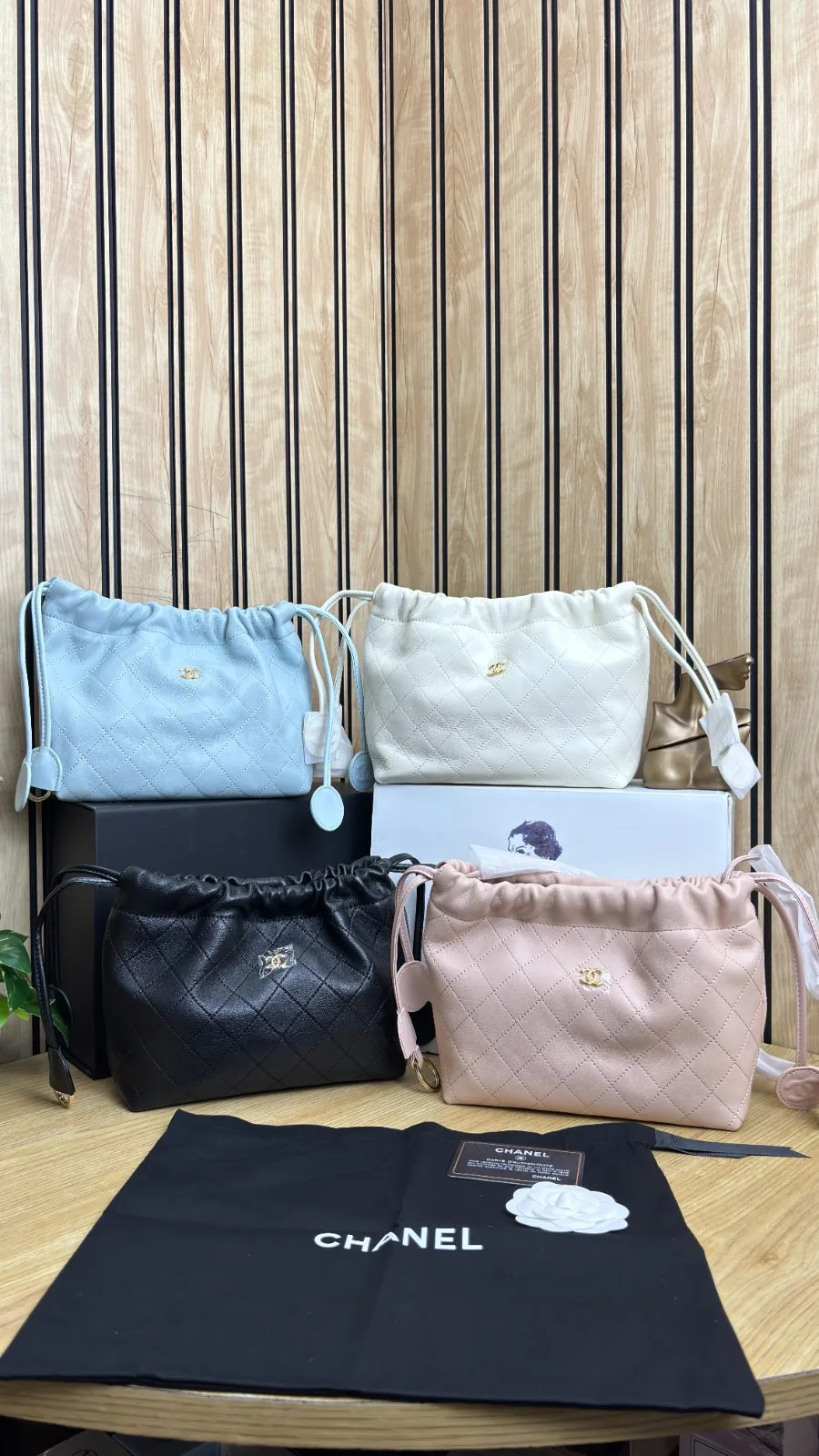 CHANEL LAMBSKIN QUILTED DRAWSTRING CLUTCH WITH STRAP